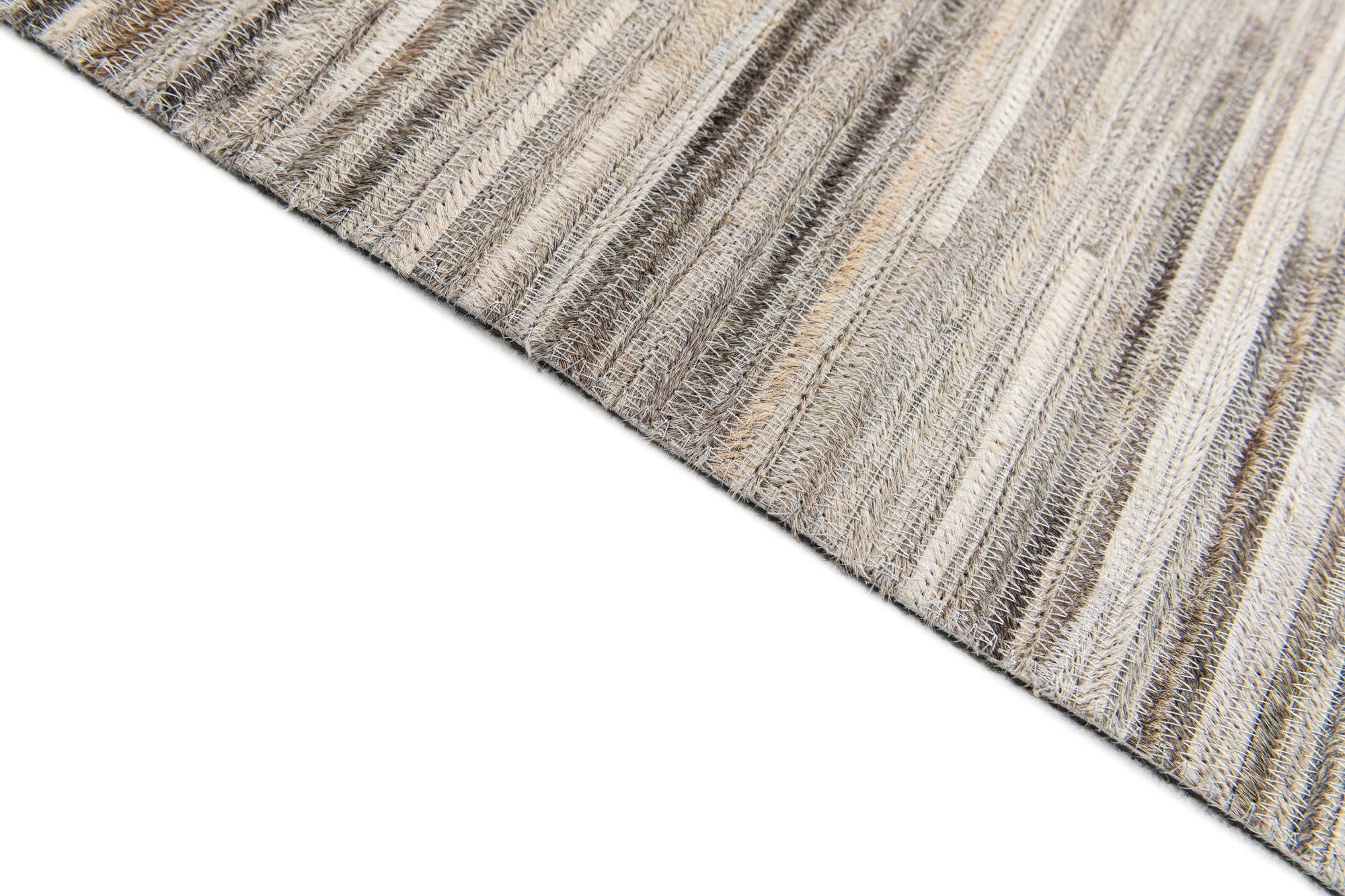 4' 11 x 8' 2 Cowhide Stocks Rug