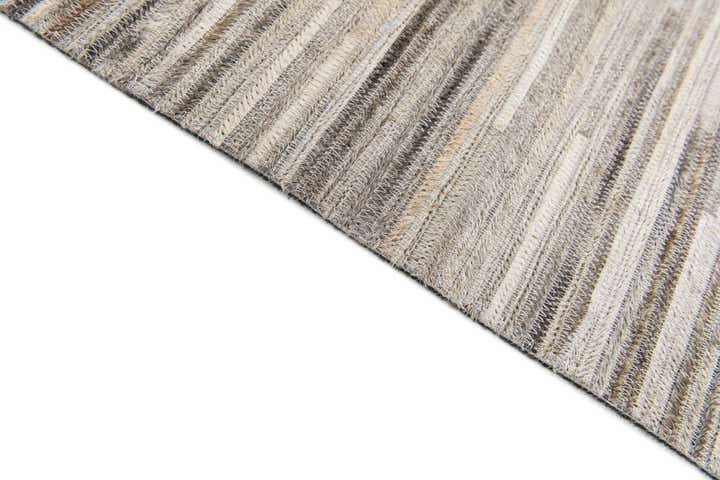 4' 11 x 8' 2 Cowhide Stocks Rug