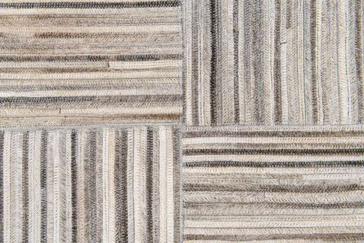 4' 11 x 8' 2 Cowhide Stocks Rug