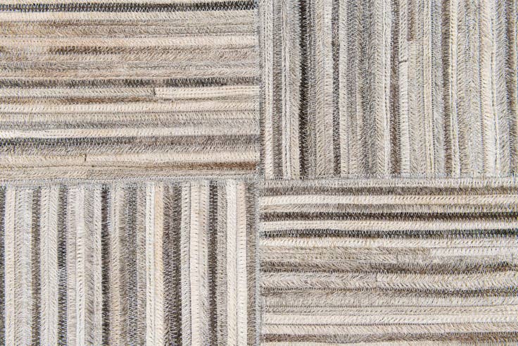 Detail image of 4' 11 x 8' 2 Cowhide Stocks Rug