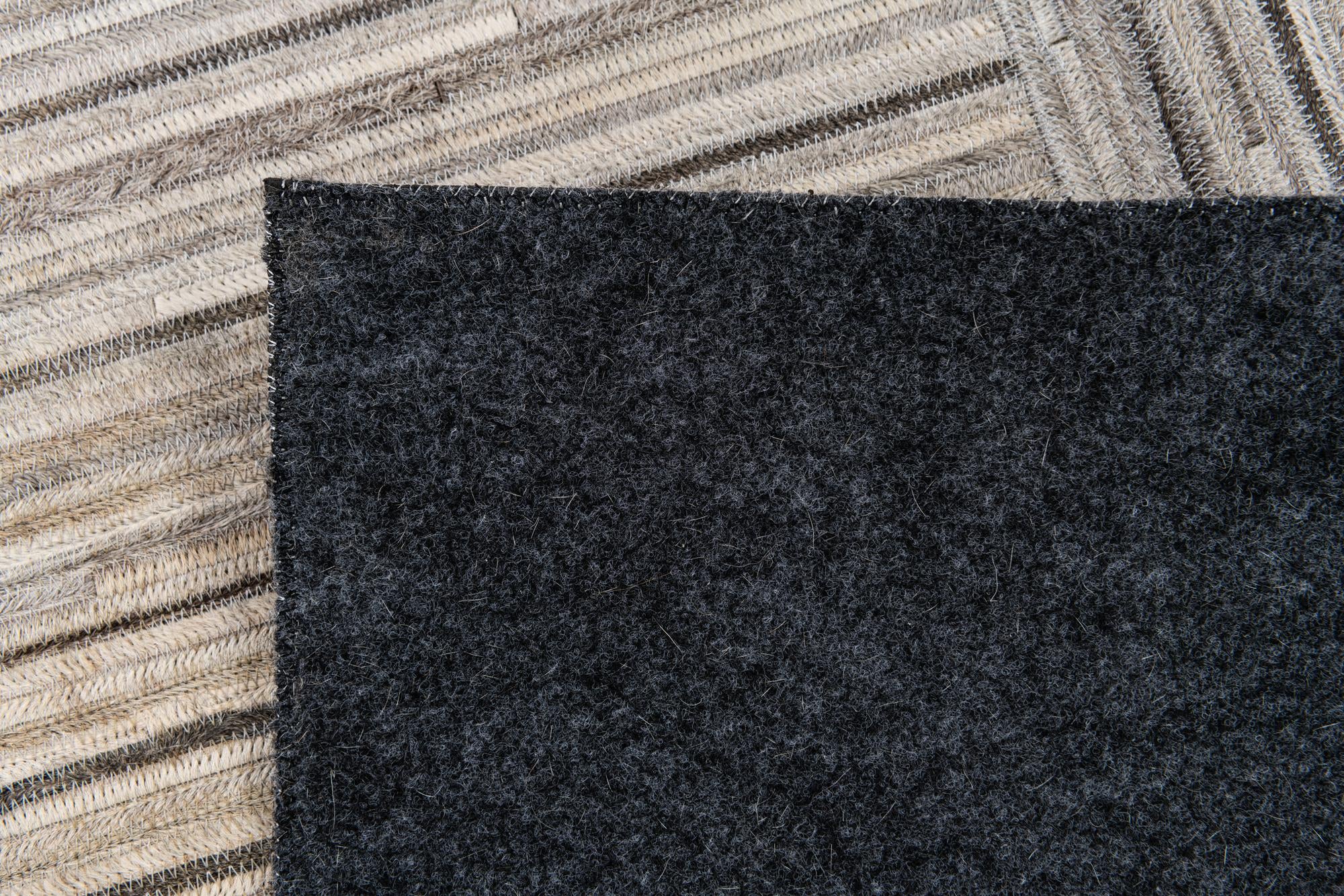 4' 11 x 8' 2 Cowhide Stocks Rug
