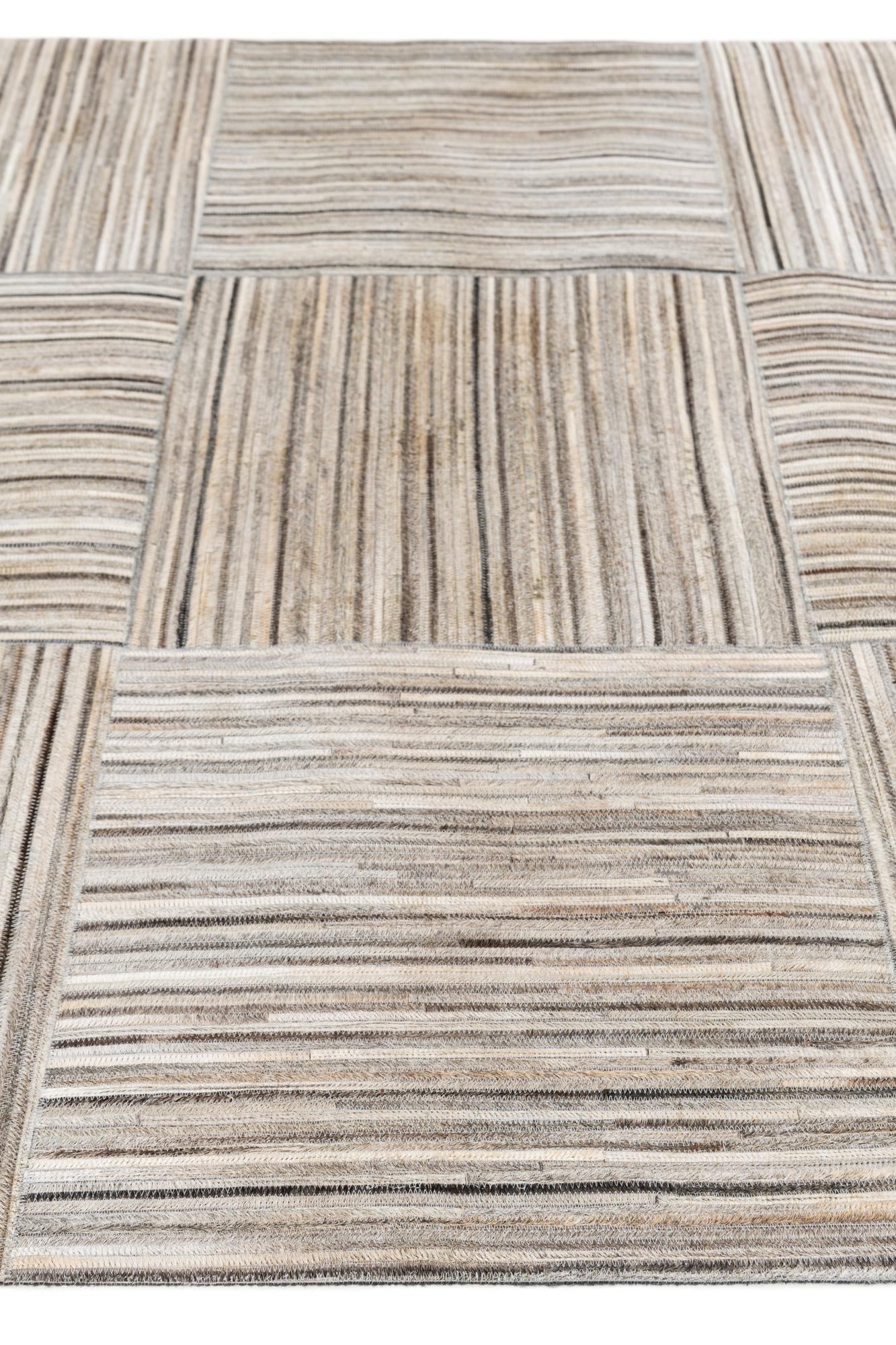 4' 11 x 8' 3 Cowhide Stocks Rug