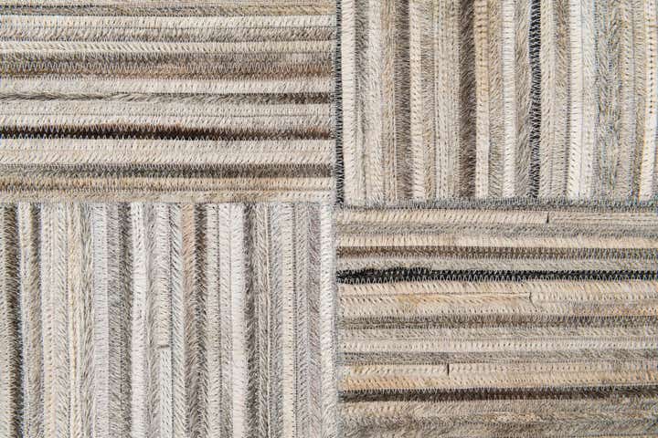 4' 11 x 8' 3 Cowhide Stocks Rug