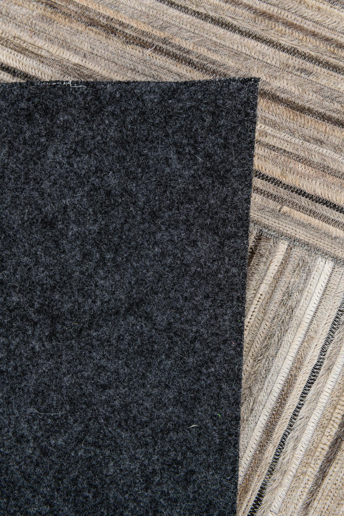 4' 11 x 8' 3 Cowhide Stocks Rug