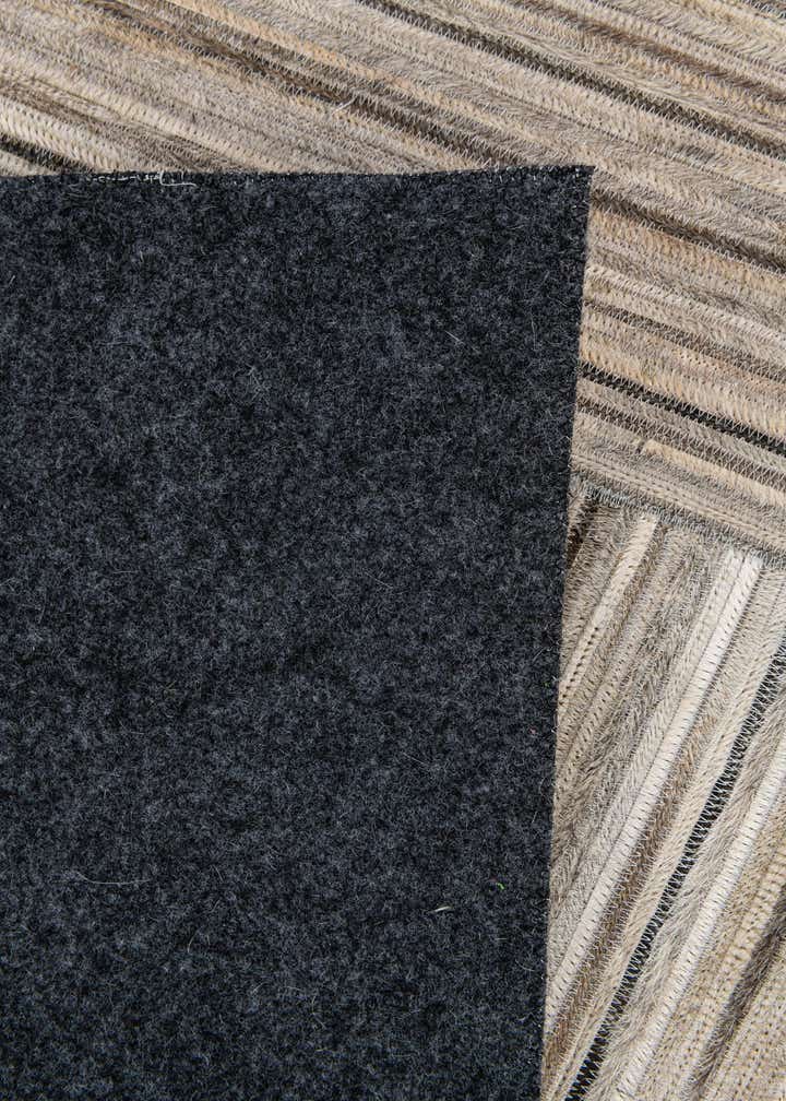 4' 11 x 8' 3 Cowhide Stocks Rug