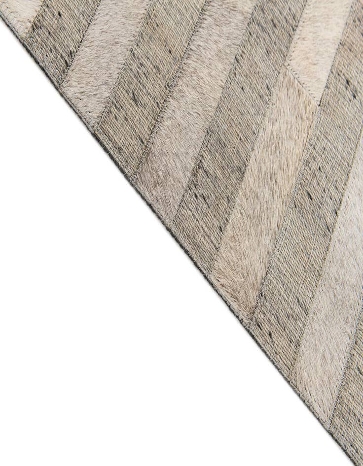 Detail image of 4' 1 x 6' 1 Cowhide Stocks Rug