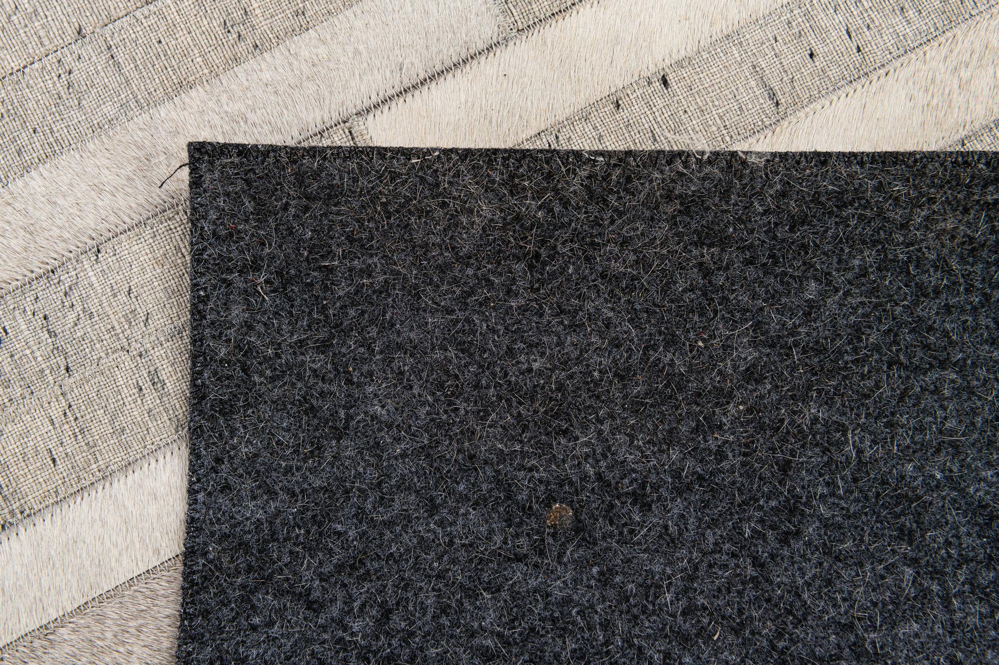 4' 1 x 6' 1 Cowhide Stocks Rug