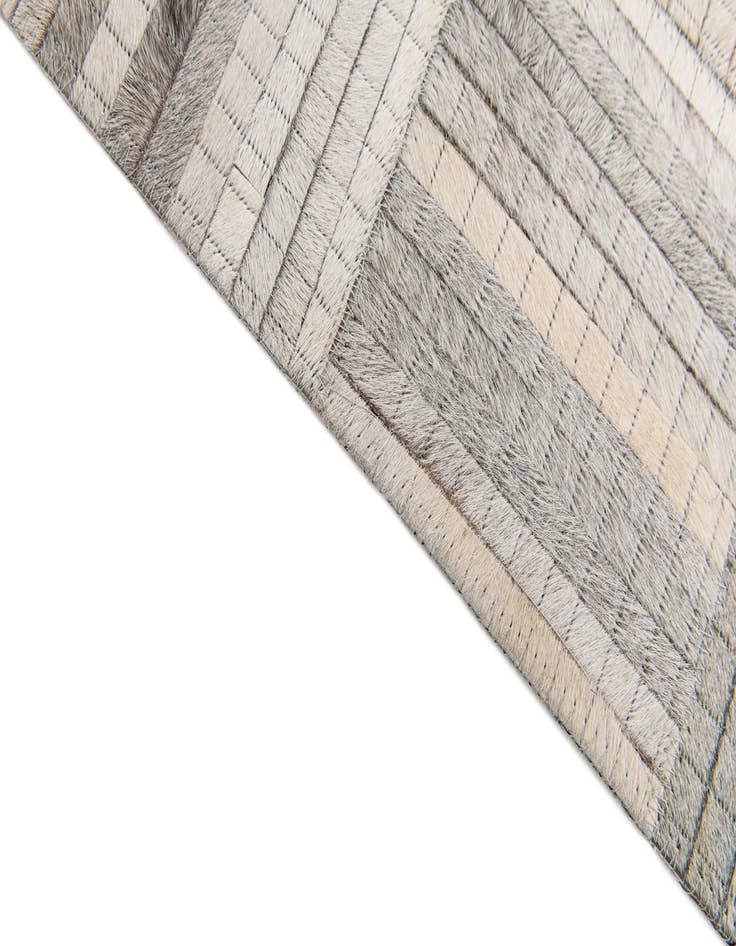 Detail image of 4' 1 x 6' 1 Cowhide Stocks Rug