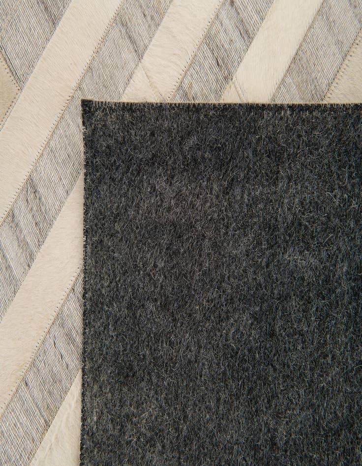 Detail image of 8' 1 x 9' 11 Cowhide Stocks Rug