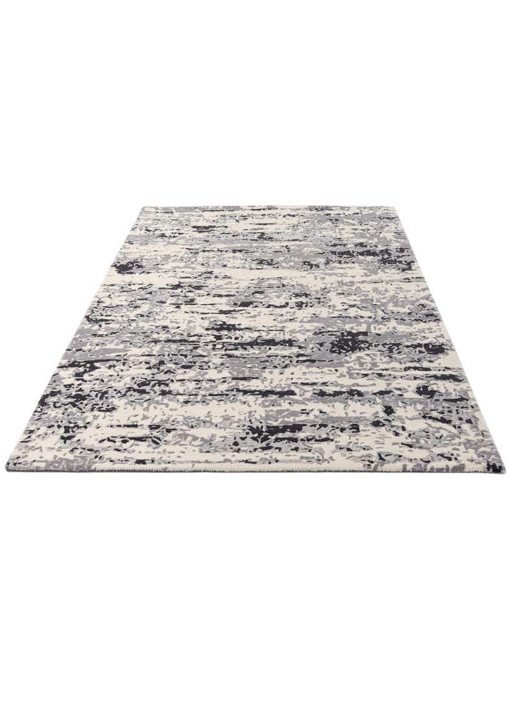 5' 2 x 8' 3 Hand Tufted Wool Rug