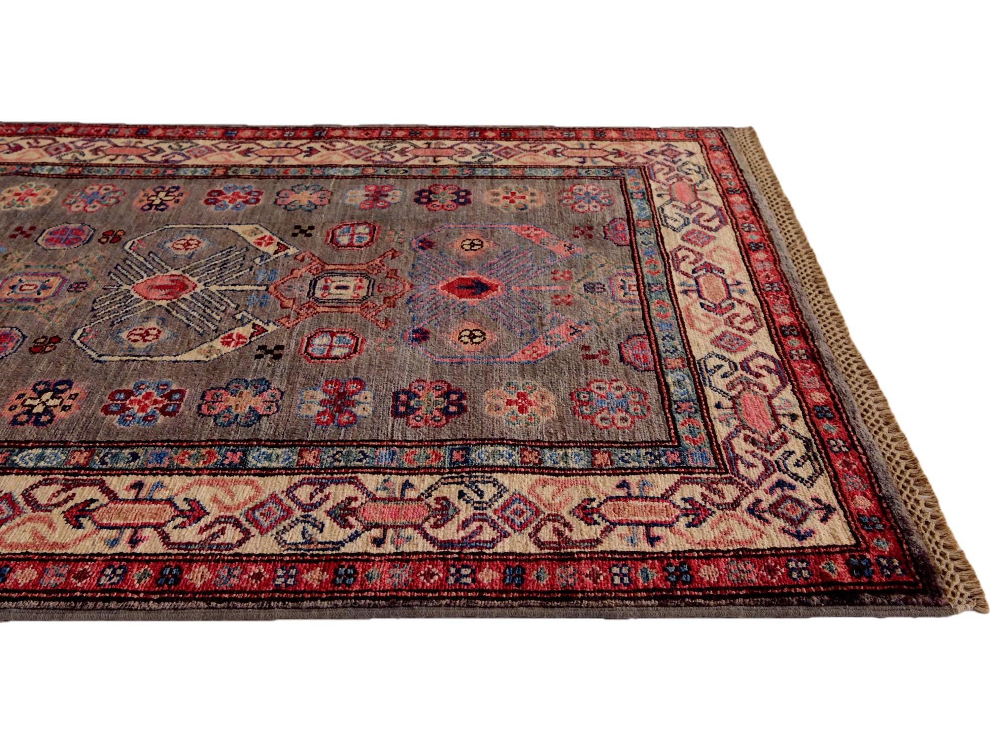 3' 3 x 5' 4 Hand Knotted Kazak Rug