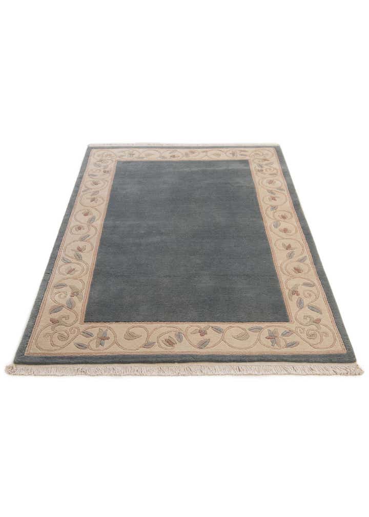 3' 11 x 5' 10 Hand Knotted Nepal Wool Rug