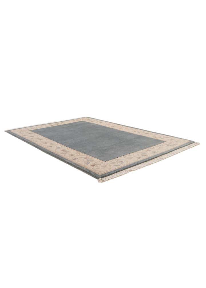 3' 11 x 5' 10 Hand Knotted Nepal Wool Rug