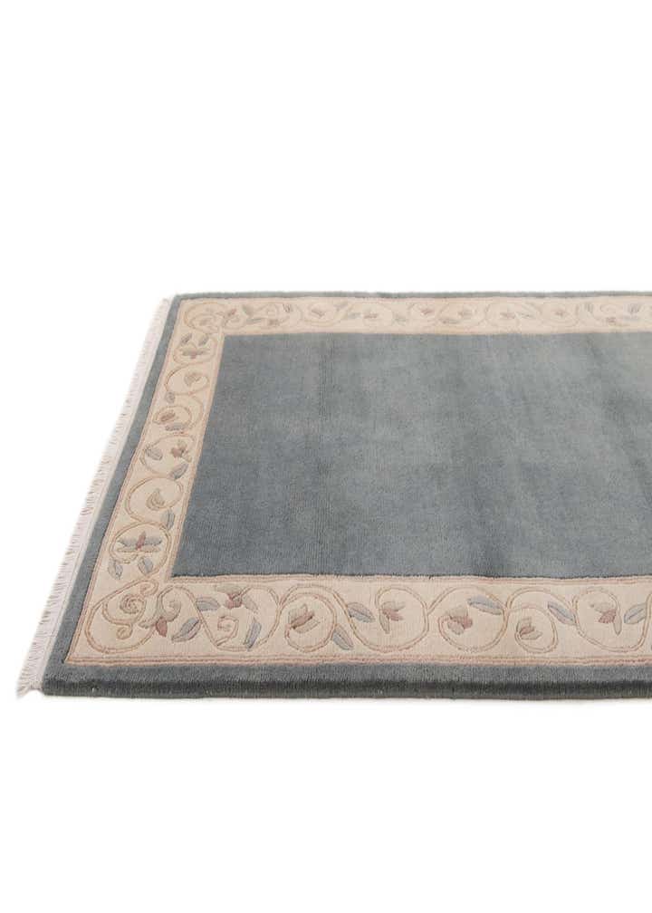 3' 11 x 5' 10 Hand Knotted Nepal Wool Rug
