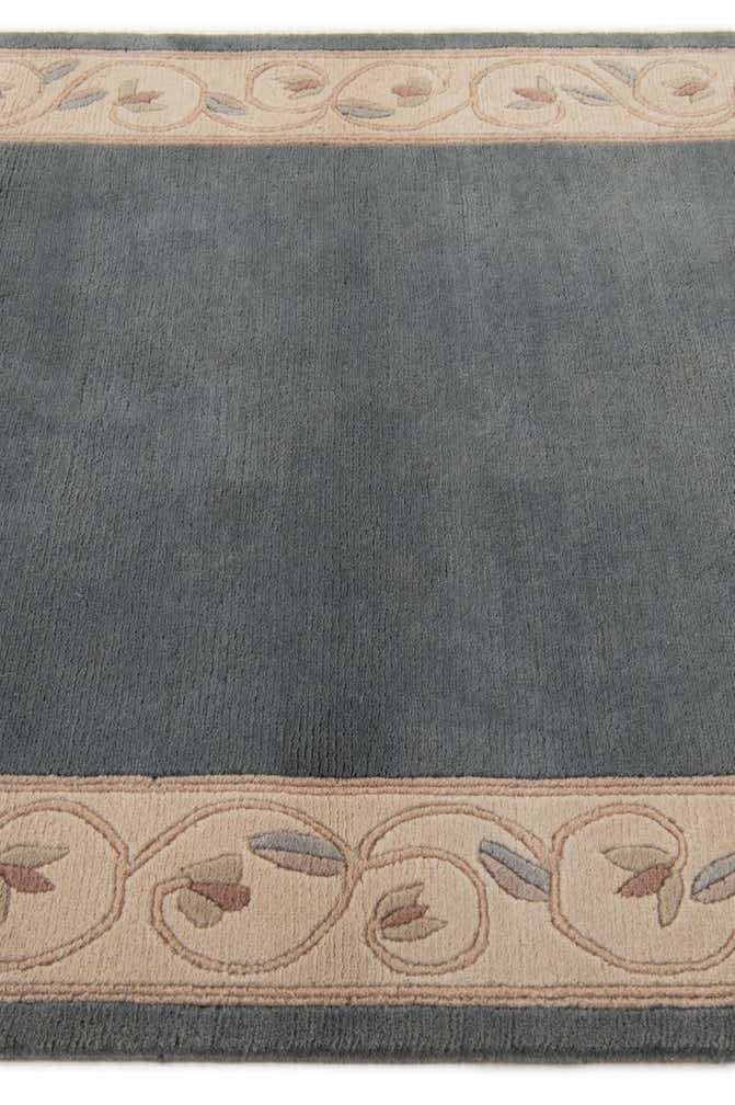 3' 11 x 5' 10 Hand Knotted Nepal Wool Rug