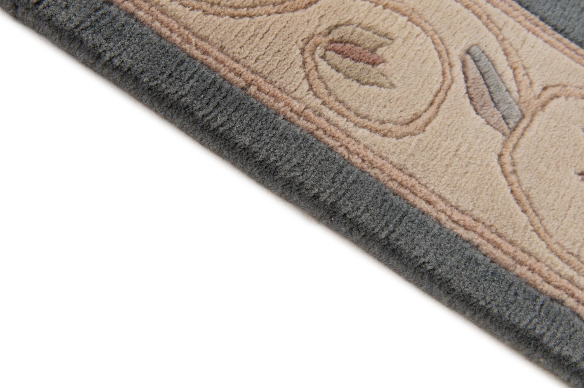 3' 11 x 5' 10 Hand Knotted Nepal Wool Rug