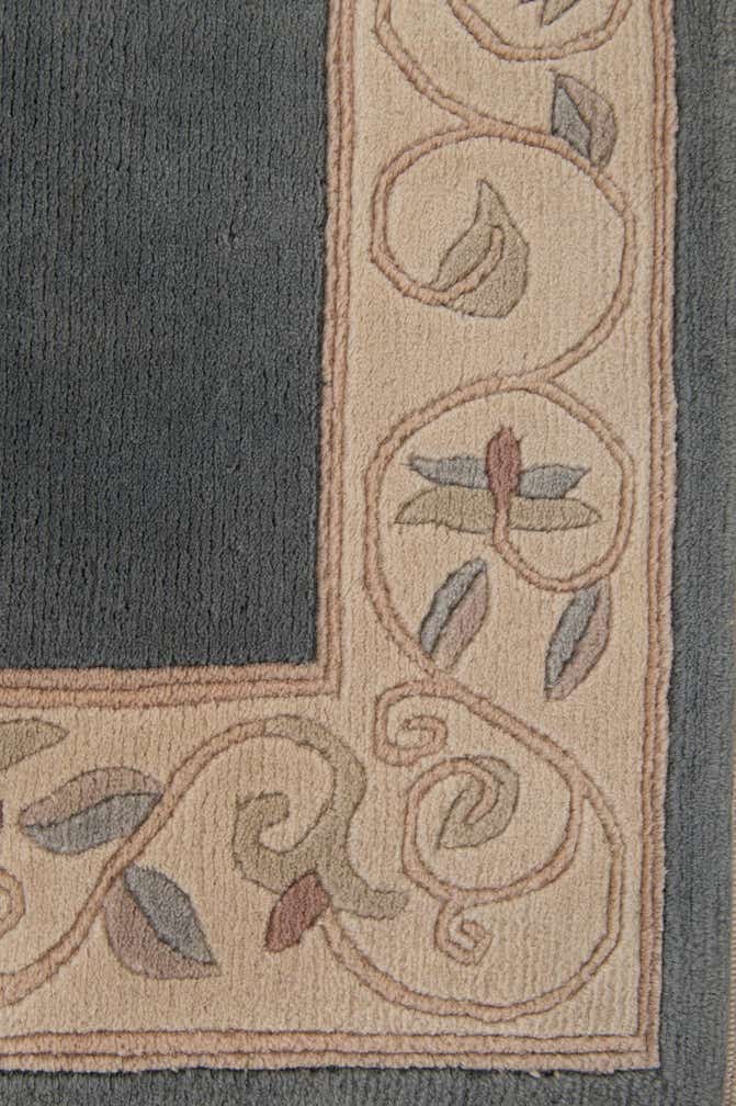 3' 11 x 5' 10 Hand Knotted Nepal Wool Rug