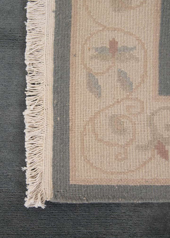 3' 11 x 5' 10 Hand Knotted Nepal Wool Rug
