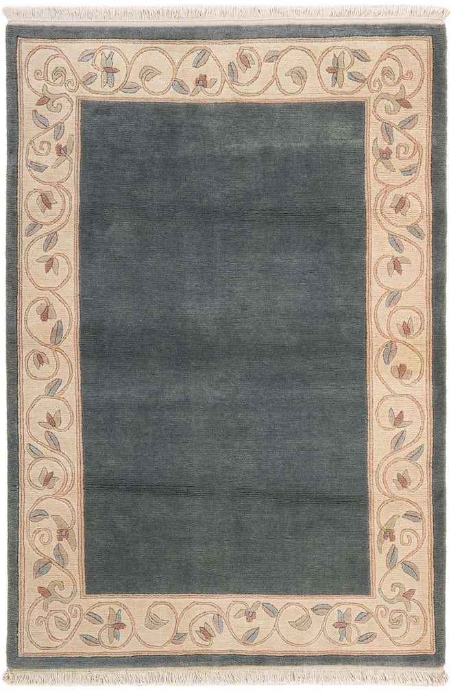 3' 11 x 5' 10 Hand Knotted Nepal Wool Rug