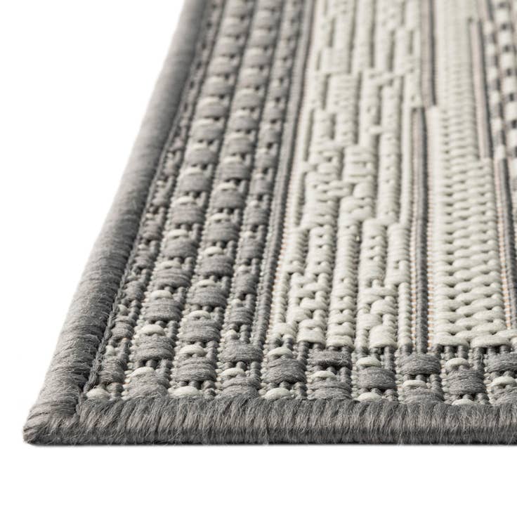 Detail image of 7' x 10' Easy-Clean Border Indoor / Outdoor Rug