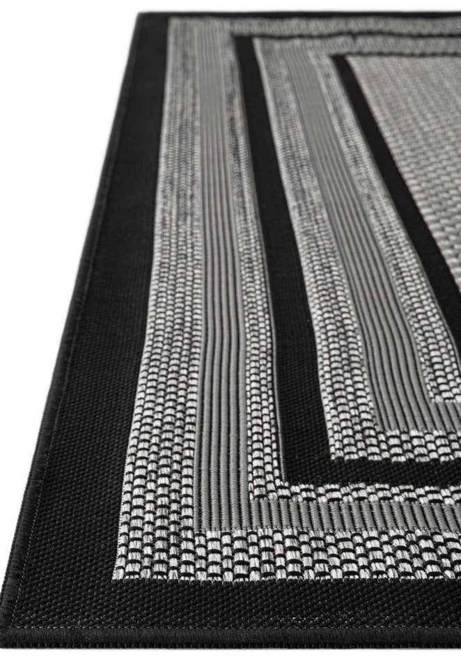 Detail image of 3' 3 x 5' Easy-Clean Border Indoor / Outdoor Rug
