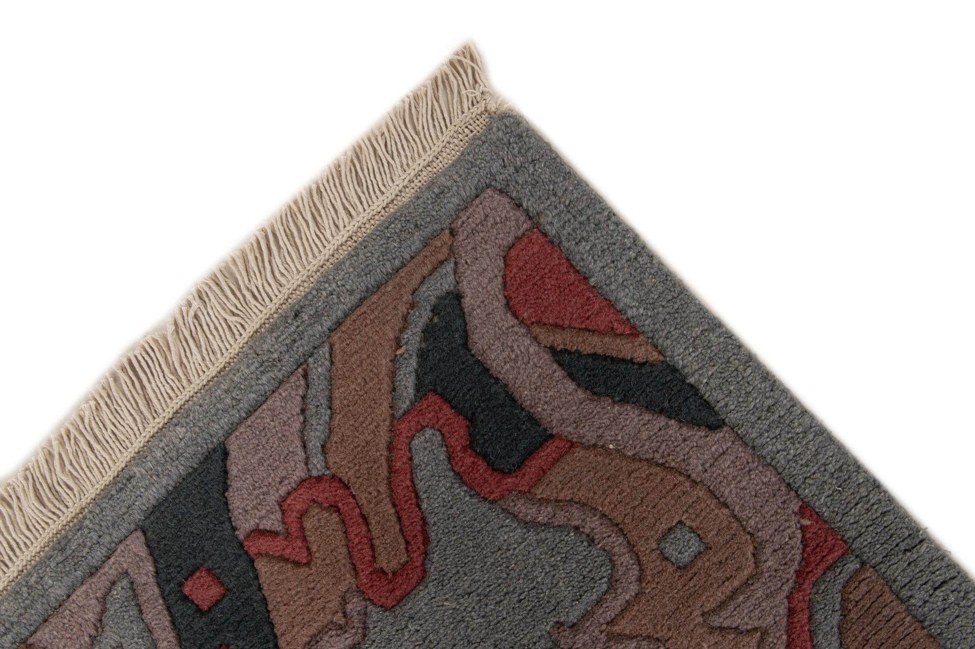 4' x 5' 10 Hand Knotted Tibet Wool Rug