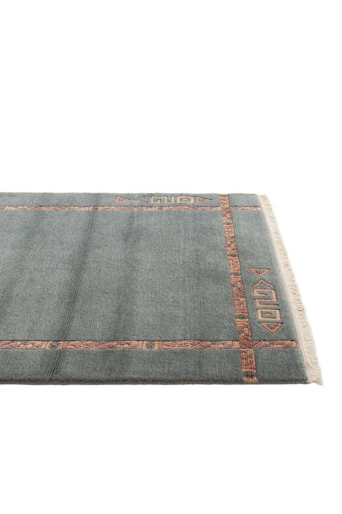 4' 2 x 5' 10 Hand Knotted Tibet Wool Rug