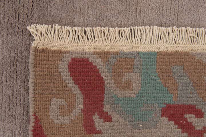 4' 1 x 5' 10 Hand Knotted Tibet Wool Rug