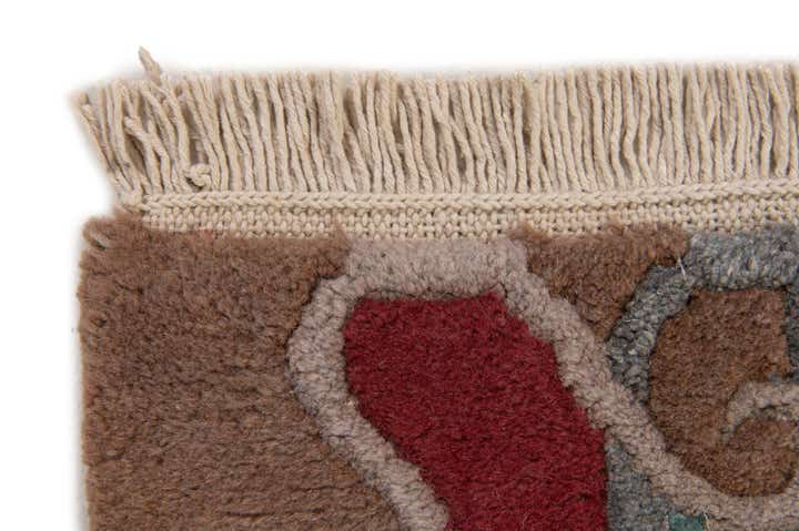 4' 1 x 5' 10 Hand Knotted Tibet Wool Rug