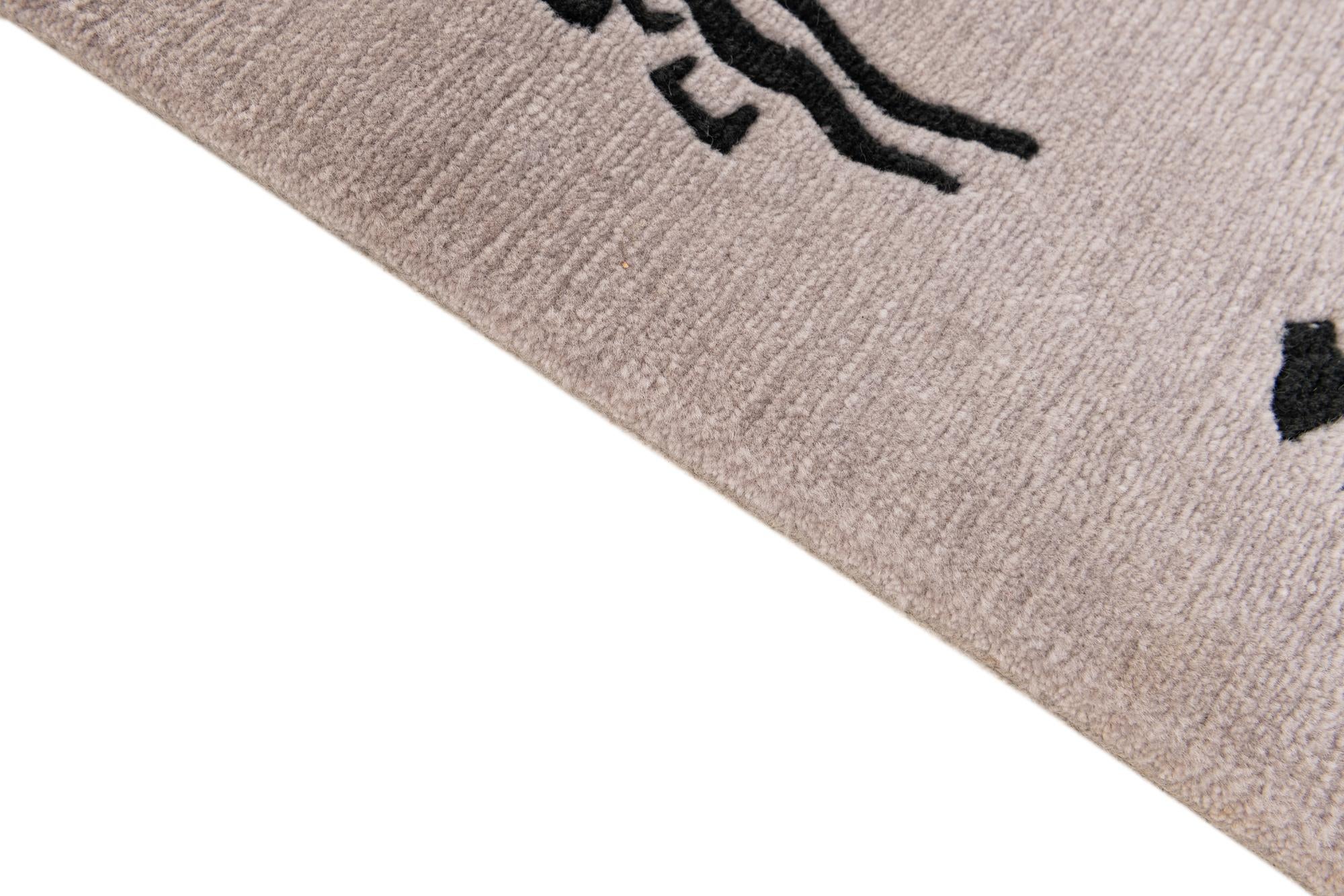 5' 7 x 7' 5 Hand Knotted Tibet Wool Rug