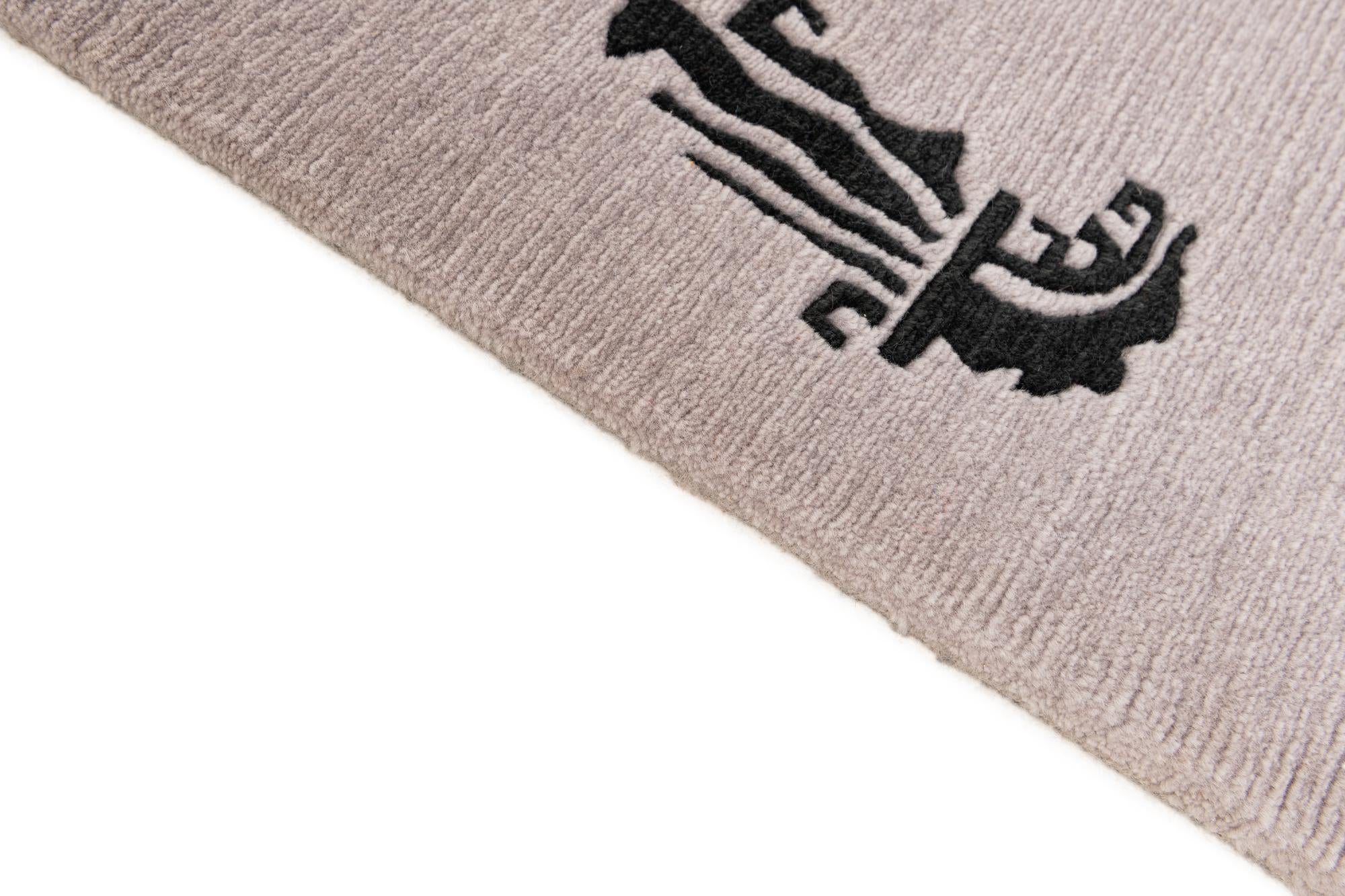 5' 7 x 7' 5 Hand Knotted Tibet Wool Rug