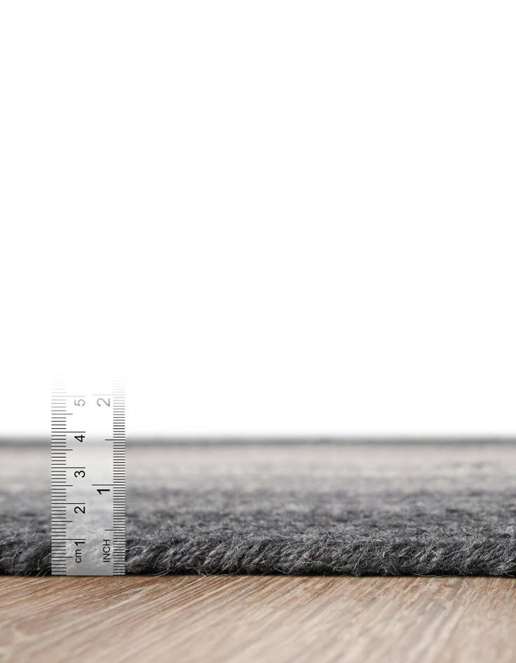 Detail image of 5' 1 x 5' 1 Hand Braided Wool Round Rug