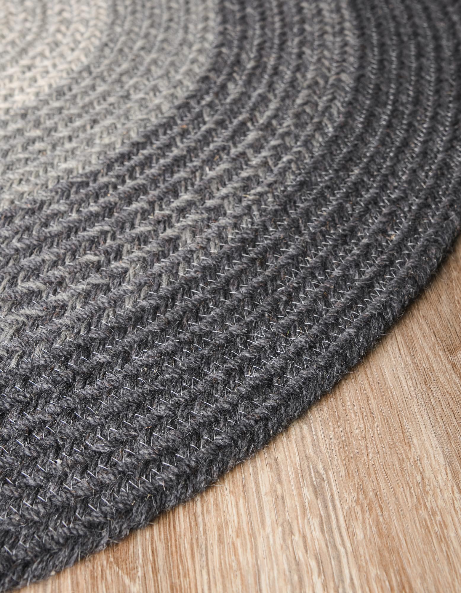 5' 1 x 5' 1 Hand Braided Wool Round Rug