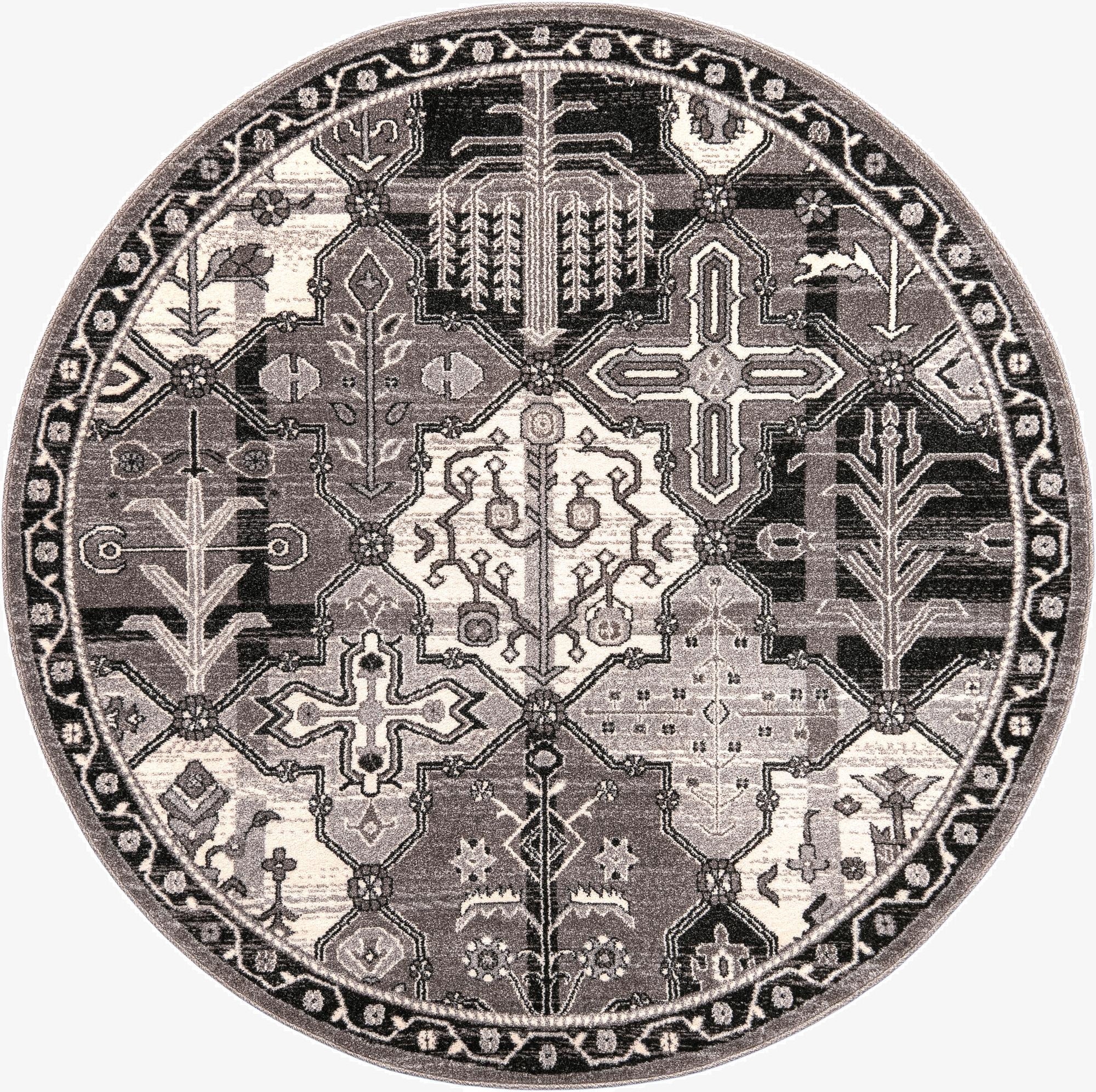 A 6' round gray Bohemian rug with a complex medallion and botanical pattern, featuring shades of gray, silver, and cream.