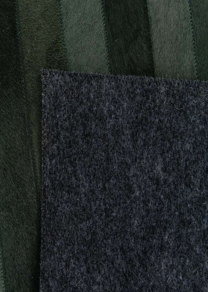 5' 1 x 7' 10 Cowhide Stocks Rug