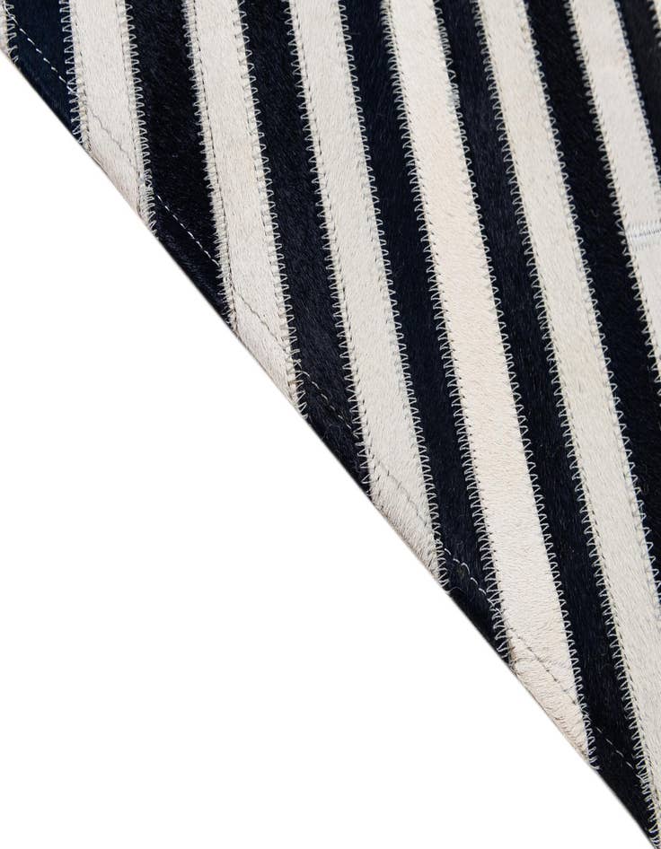 Detail image of 7' 11 x 10' 11 Cowhide - Patchwork Rug
