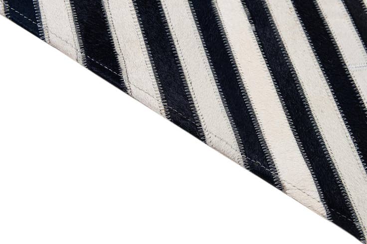 Detail image of 7' 11 x 10' 11 Cowhide - Patchwork Rug