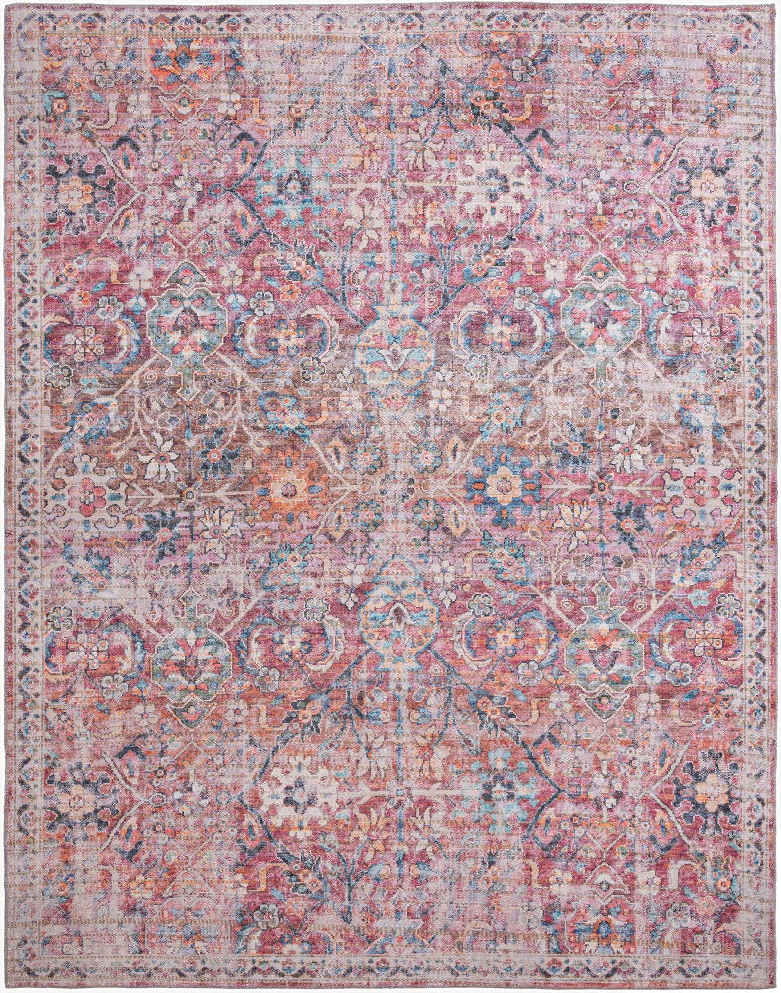 A 10x13 rectangular Nostalgia rug featuring a distressed traditional floral pattern in ivories, creams, pinks, and blues.