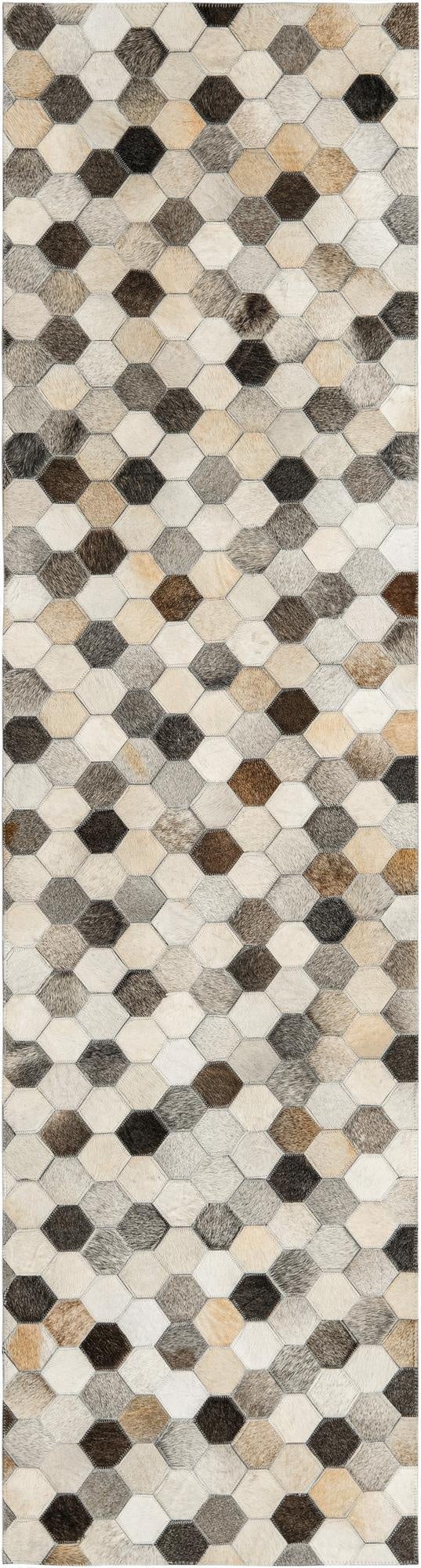 An 8 ft runner rug featuring a modern, abstract honeycomb pattern made from patched cowhide in shades of ivory, cream, gray, and white.