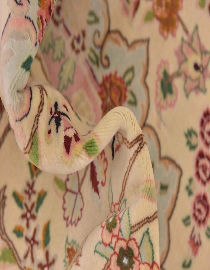 Detail image of 6' 7 x 9' 10 Hand Knotted Tabriz Persian Oval Rug