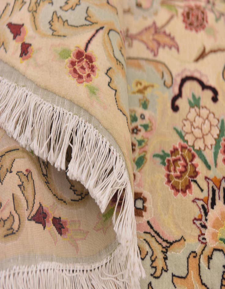 Detail image of 6' 7 x 9' 10 Hand Knotted Tabriz Persian Oval Rug