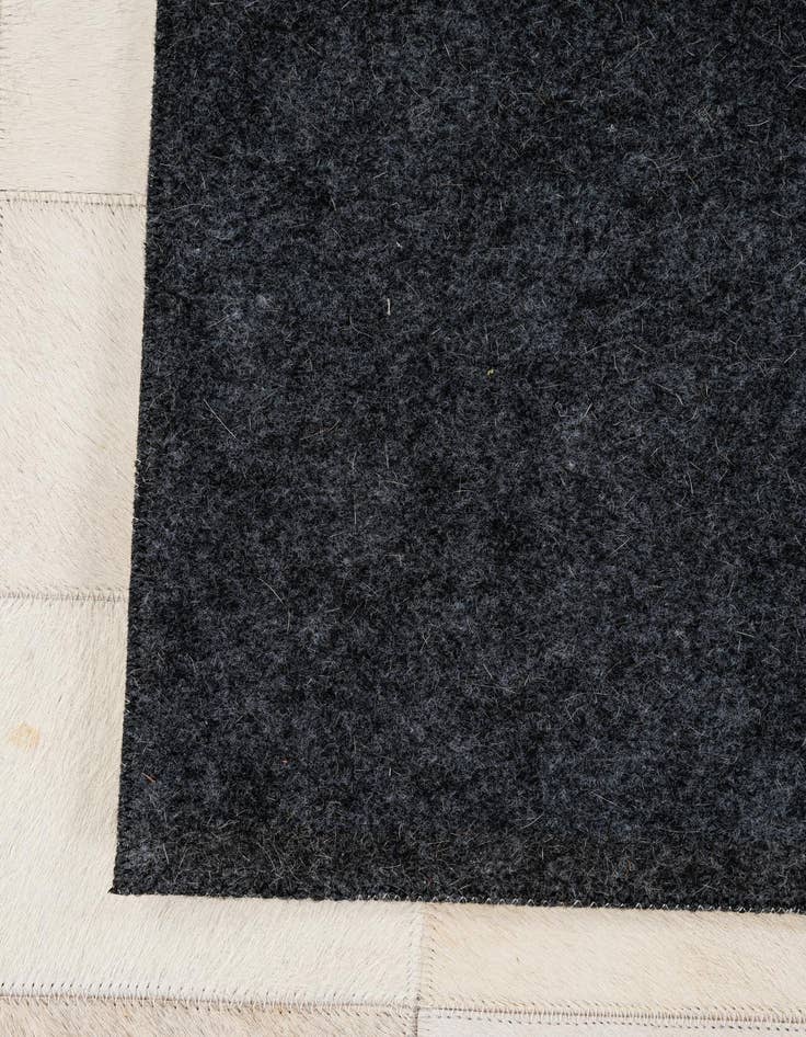 Detail image of 5' 1 x 7' 11 Cowhide - Patchwork Rug