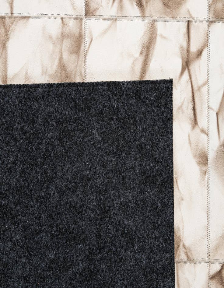 Detail image of 5' x 7' 11 Cowhide - Patchwork Rug