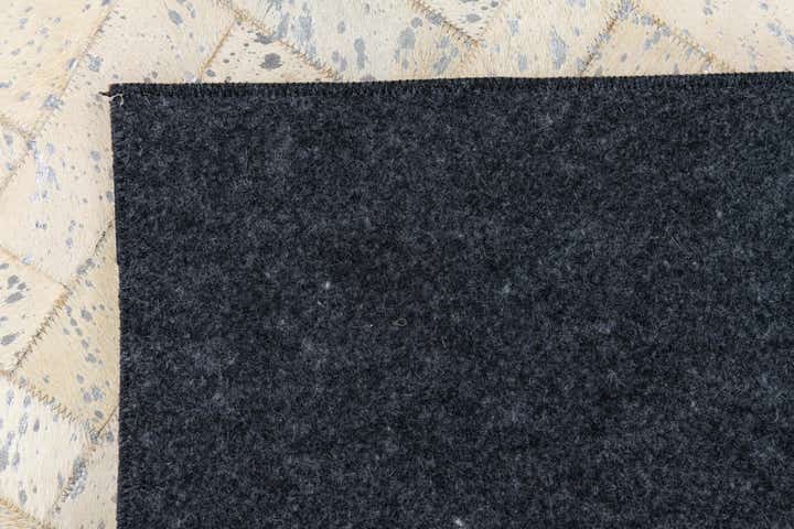 5' x 7' 9 Cowhide Leather Rug