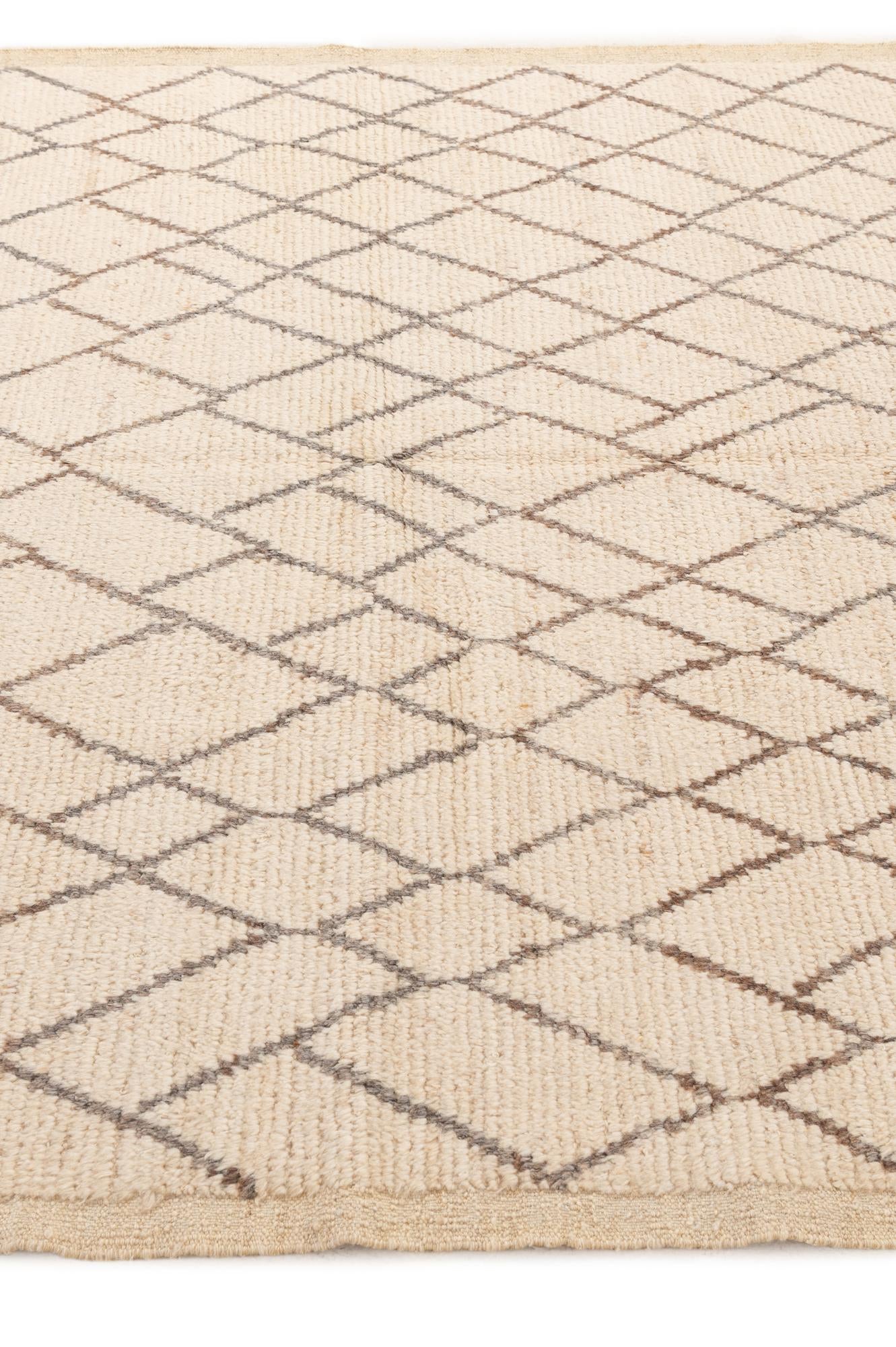 5' 9 x 8' 7 Hand Knotted Moroccan Wool Rug