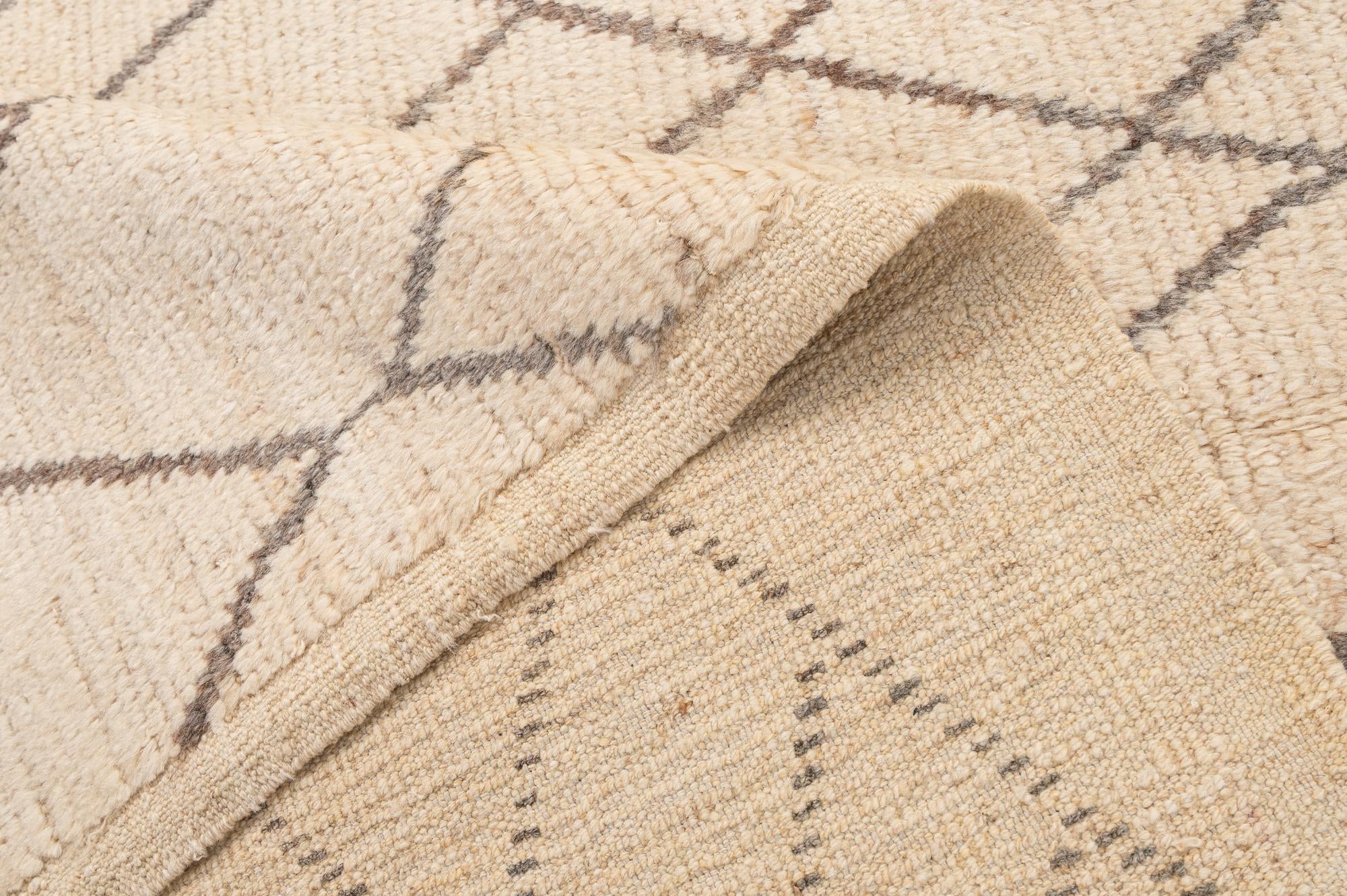 5' 9 x 8' 7 Hand Knotted Moroccan Wool Rug