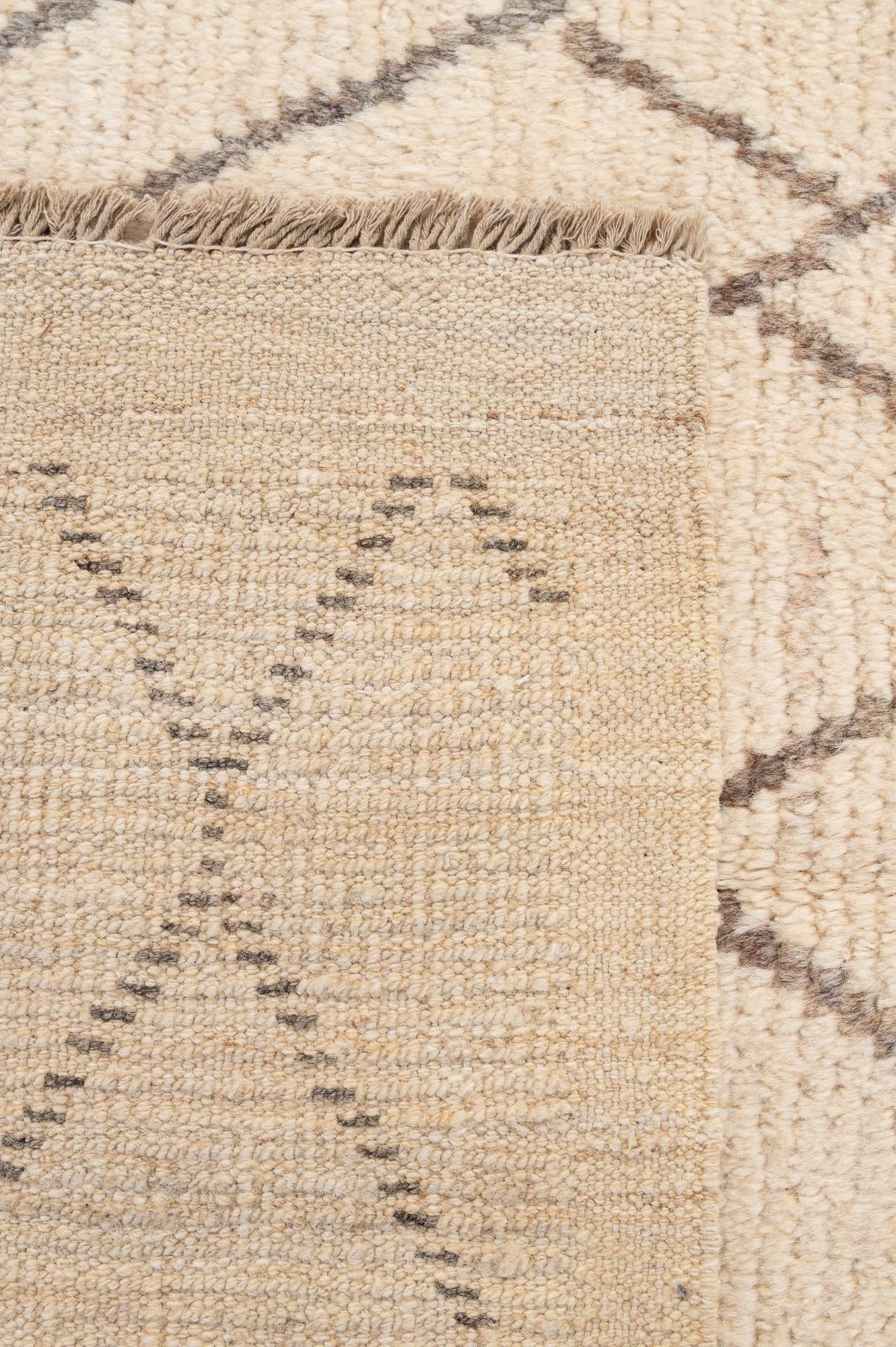 5' 9 x 8' 7 Hand Knotted Moroccan Wool Rug