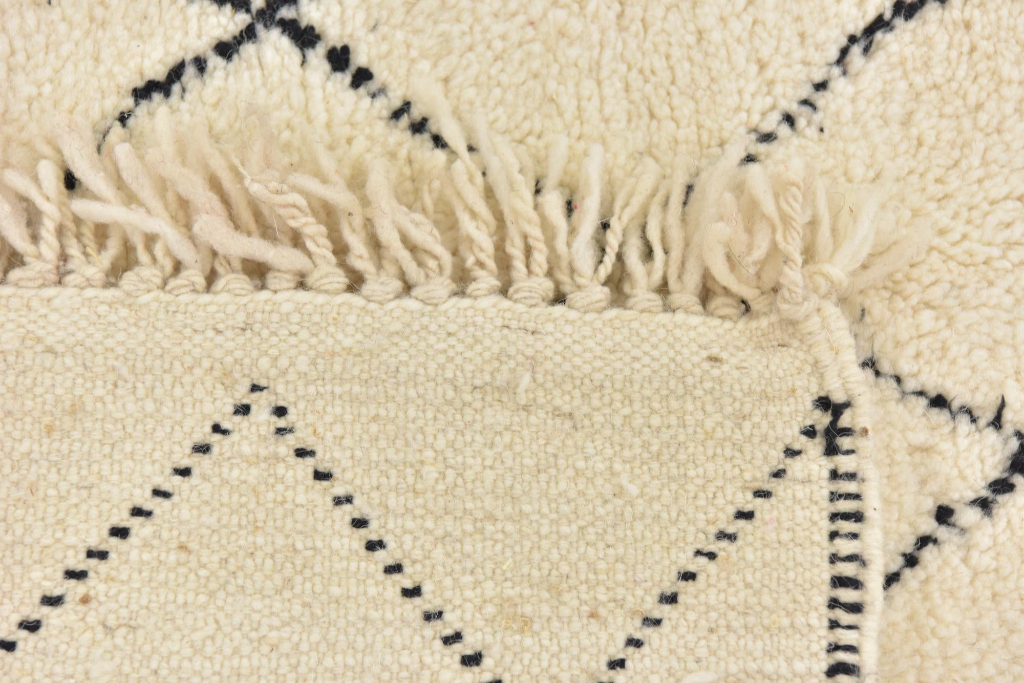 5' x 8' 8 Hand Knotted Moroccan Wool Rug