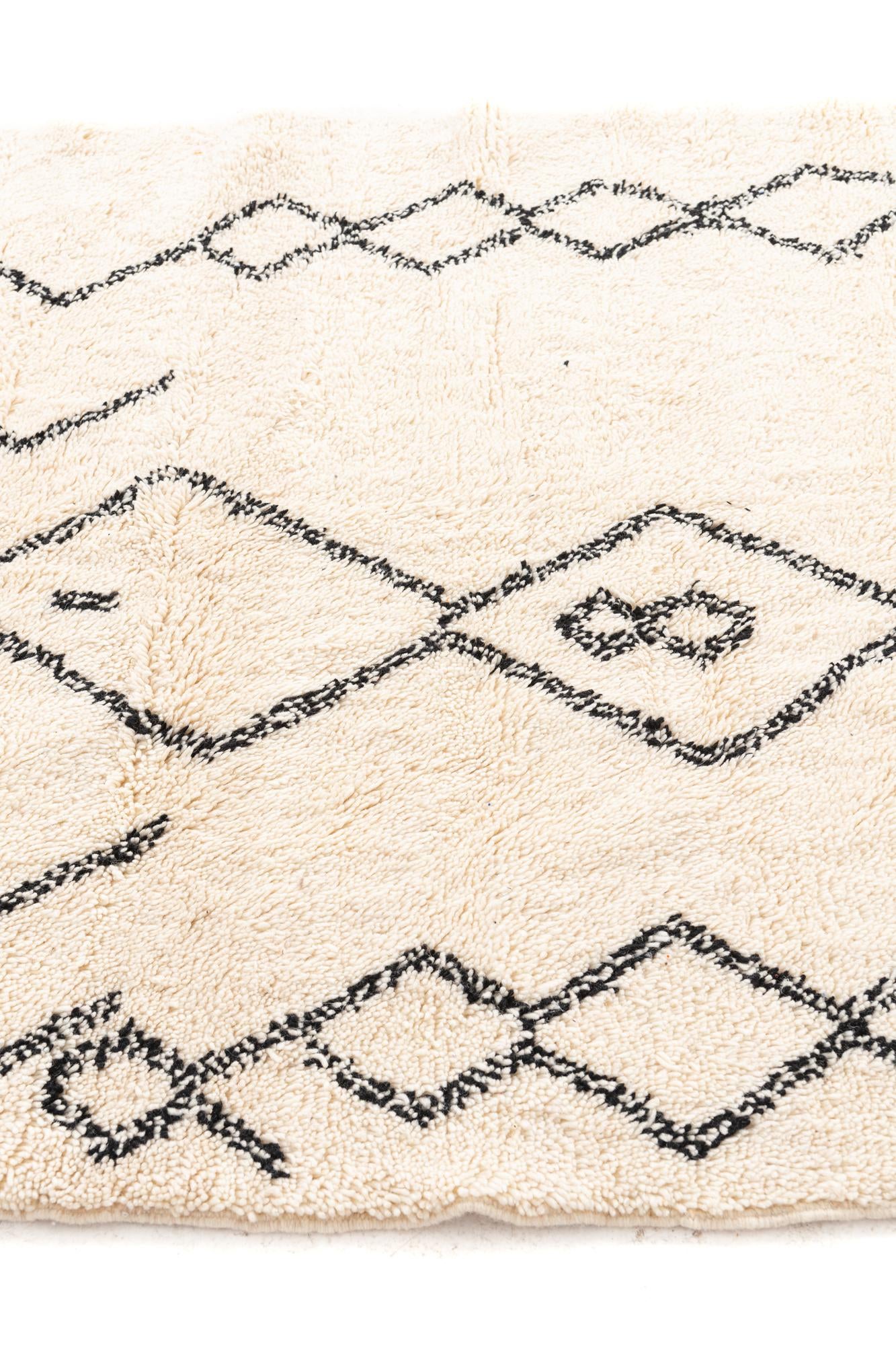 5' x 7' 7 Hand Knotted Moroccan Wool Rug