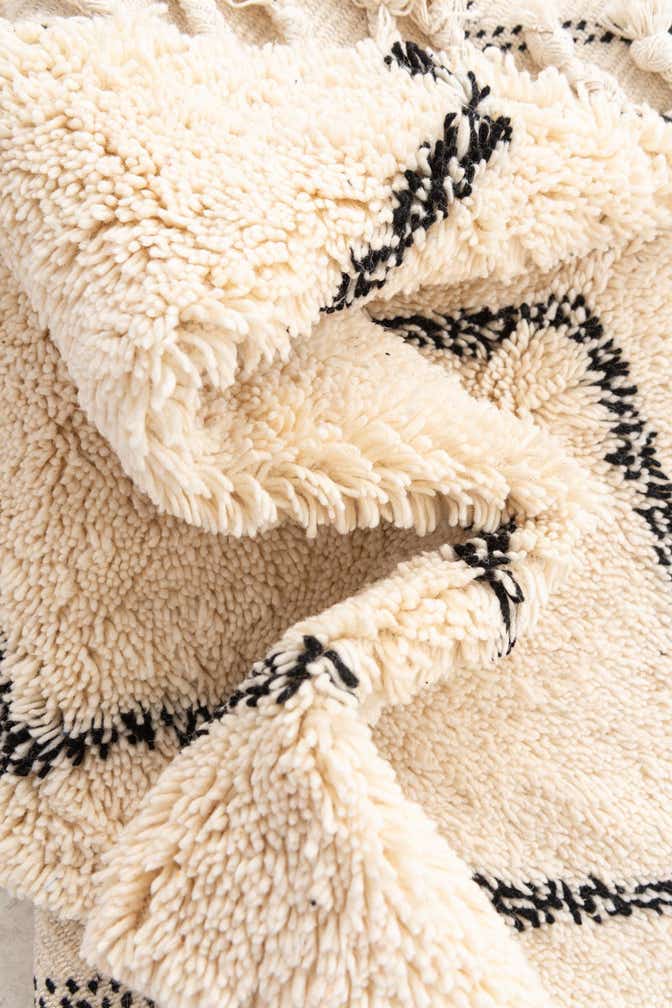 5' x 7' 7 Hand Knotted Moroccan Wool Rug